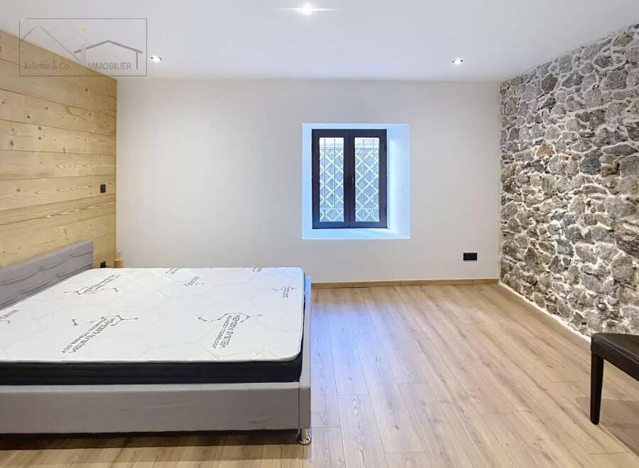 Discover the charm of this unique property featuring a blend of modern and rustic elements.