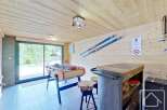 This stunning property boasts a unique entertainment space, perfect for relaxation and fun.