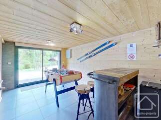 This stunning property boasts a unique entertainment space, perfect for relaxation and fun.