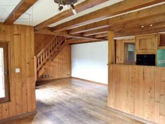 Discover the charm of this inviting property, featuring warm wooden accents throughout.