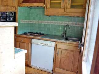 Discover the charm of this cozy kitchen, perfect for culinary adventures.