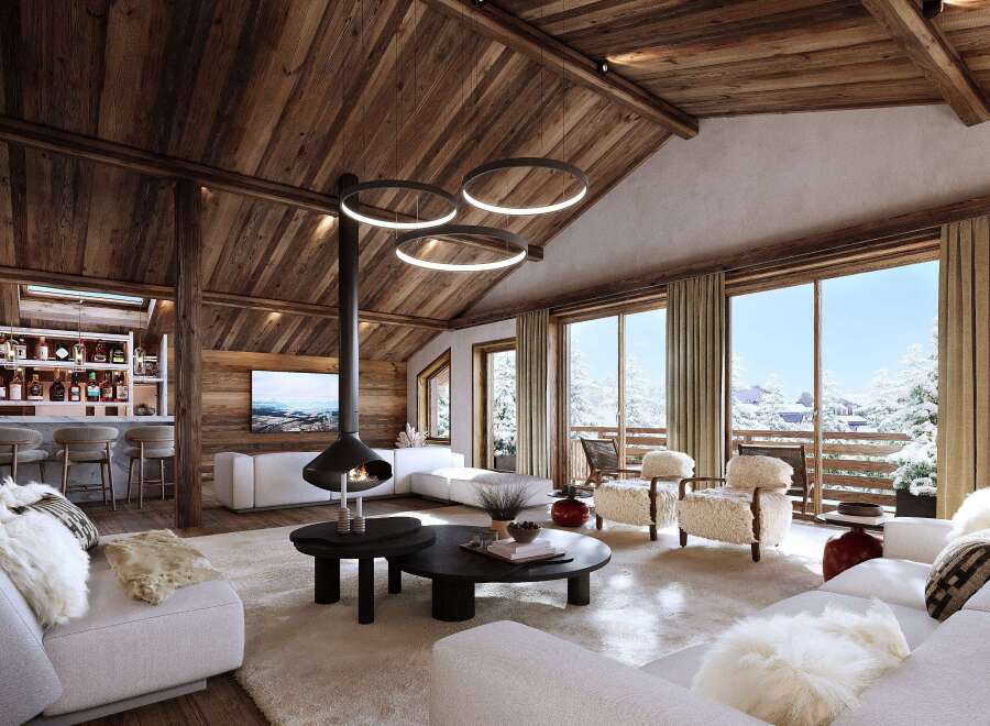 Experience luxury living in this stunning chalet, featuring a cozy fireplace and a modern open-plan design.