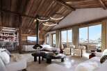 Experience luxury living in this stunning chalet, featuring a cozy fireplace and a modern open-plan design.