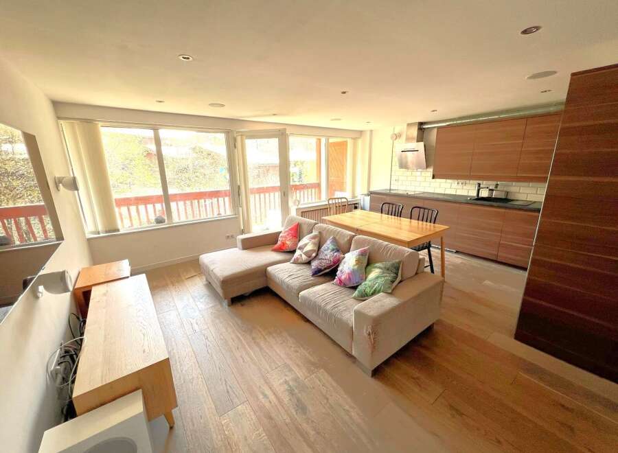 This stunning property boasts a modern open-plan living space, perfect for entertaining and relaxation.