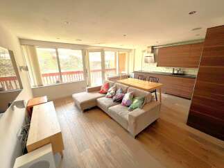 This stunning property boasts a modern open-plan living space, perfect for entertaining and relaxation.