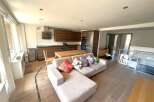 This stunning property features a modern open-plan kitchen and living area, perfect for entertaining.