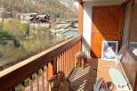 Enjoy breathtaking mountain views from this charming balcony.
