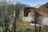Discover a charming mountain retreat nestled amidst stunning alpine scenery.