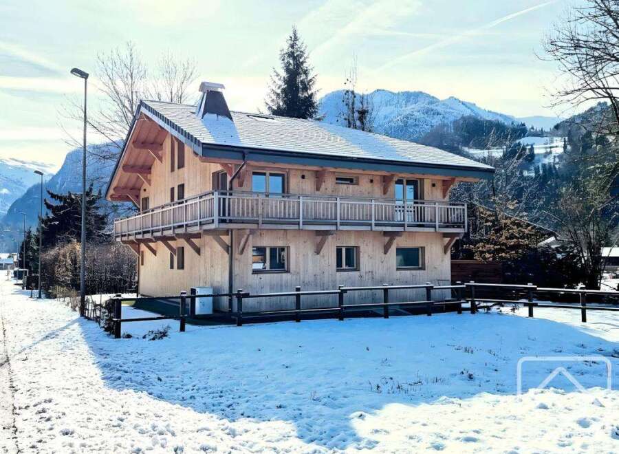 This stunning wooden chalet offers a perfect blend of rustic charm and modern comfort.