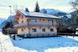 This stunning wooden chalet offers a perfect blend of rustic charm and modern comfort.