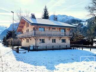 This stunning wooden chalet offers a perfect blend of rustic charm and modern comfort.