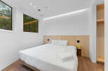 Experience modern comfort in this stylish bedroom.