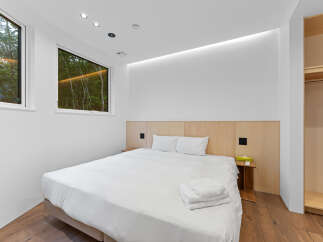 Experience modern comfort in this stylish bedroom.
