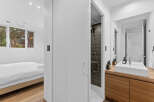This modern property boasts a sleek bathroom design with a spacious shower and a stylish vanity.