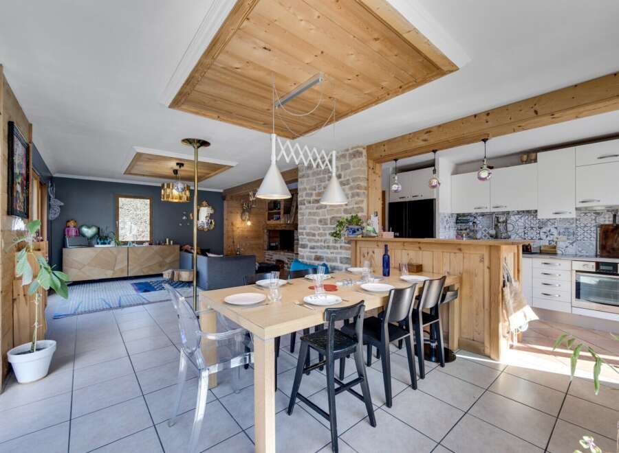 This stunning property boasts a seamless blend of rustic charm and modern elegance.