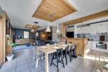 This stunning property boasts a seamless blend of rustic charm and modern elegance.