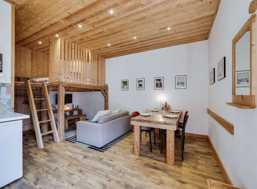 Discover the charm of this cozy mountain retreat, featuring a unique loft space perfect for relaxation.
