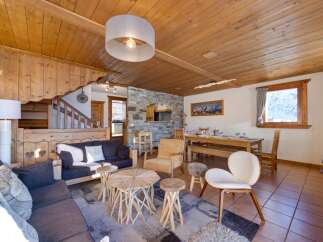 Discover the charm of this cozy chalet, perfect for a mountain getaway.