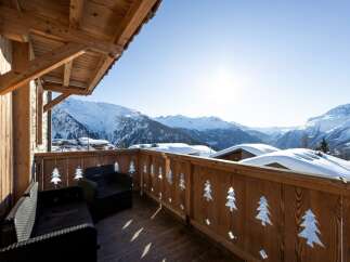 Enjoy breathtaking mountain views from this stunning balcony.