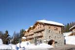 Discover the charm of this stunning chalet nestled in a picturesque winter wonderland.