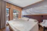 Experience the ultimate in alpine luxury with this stunning bedroom.