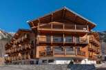 Discover the charm of this stunning wooden chalet, a perfect blend of rustic elegance and modern comfort.