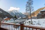 Experience the charm of mountain living with this stunning property.