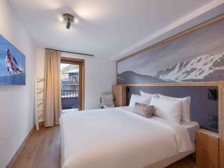 Experience luxury and comfort in this stunning bedroom.