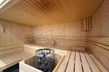 Step into relaxation with this stunning sauna.