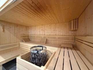 Step into relaxation with this stunning sauna.