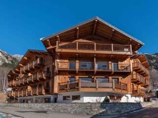 Discover the charm of this stunning wooden chalet, a perfect blend of rustic elegance and modern comfort.