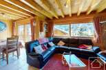 Discover the charm of this cozy property, featuring a spacious living area with a comfortable leather sofa.