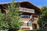 Discover the charm of this stunning wooden chalet, nestled in a picturesque setting.