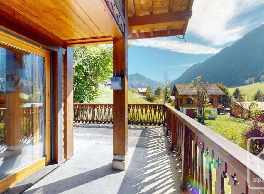 Enjoy breathtaking mountain views from this charming chalet.