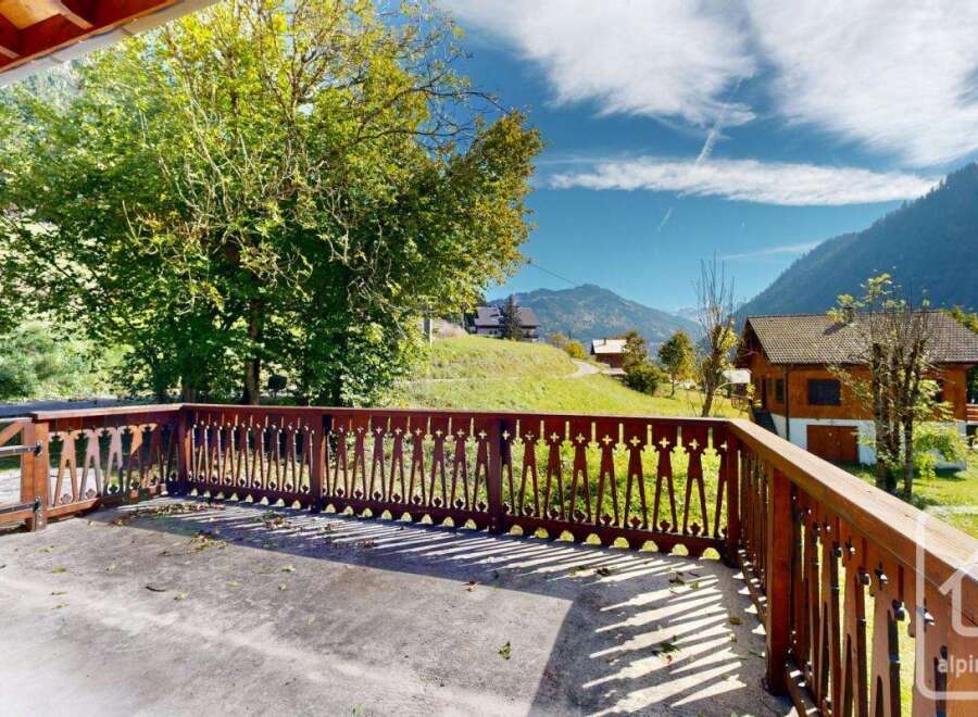 Enjoy breathtaking mountain views from this charming property.