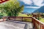 Enjoy breathtaking mountain views from this charming property.