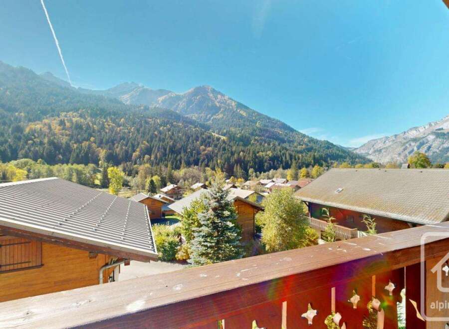 Experience breathtaking mountain views from this charming property.