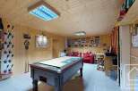This cozy property features a spacious game room, perfect for entertaining.