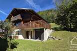 Discover the charm of this stunning chalet nestled in a picturesque setting.