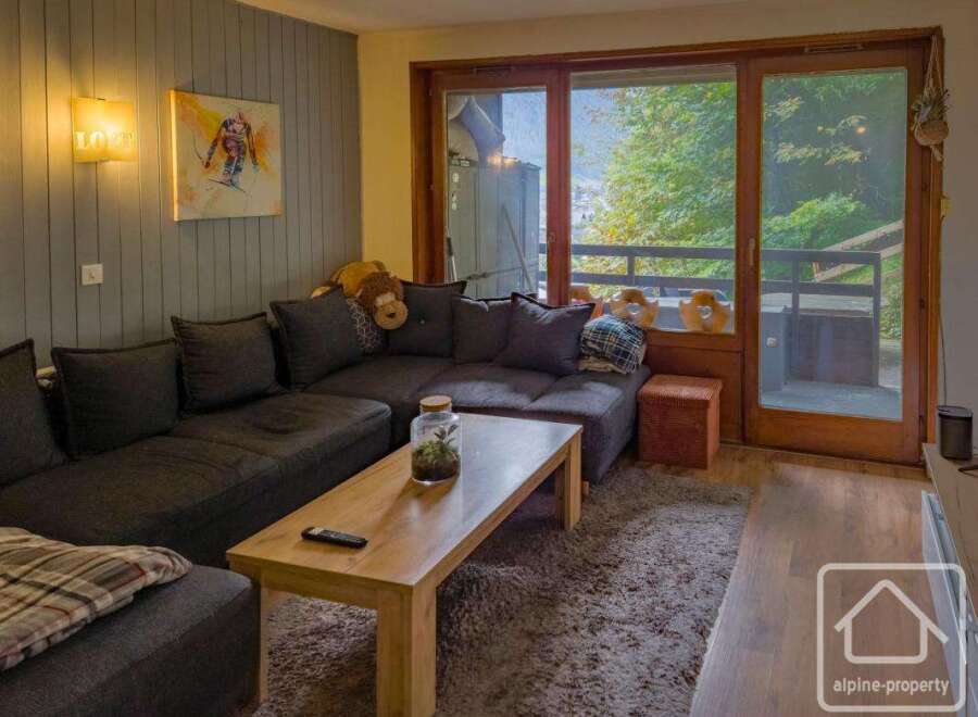 Discover the charm of this cozy living space, perfect for relaxation and entertaining.