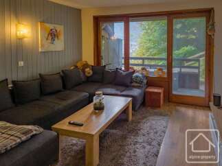 Discover the charm of this cozy living space, perfect for relaxation and entertaining.