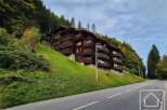 Discover a stunning property nestled in a picturesque mountain setting.