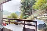 Enjoy breathtaking mountain views from this charming property.