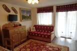 Step into this charming living space, perfect for relaxation and entertaining.