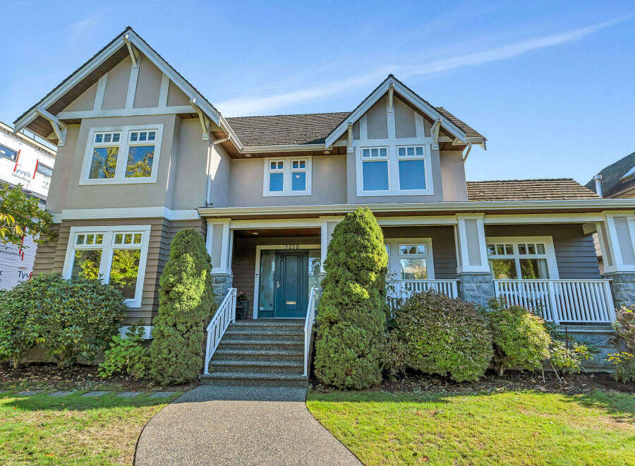 This stunning property boasts a beautiful facade with a welcoming entrance.