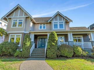 This stunning property boasts a beautiful facade with a welcoming entrance.