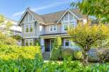 This stunning property boasts a beautiful exterior with a well-maintained yard and lush landscaping.