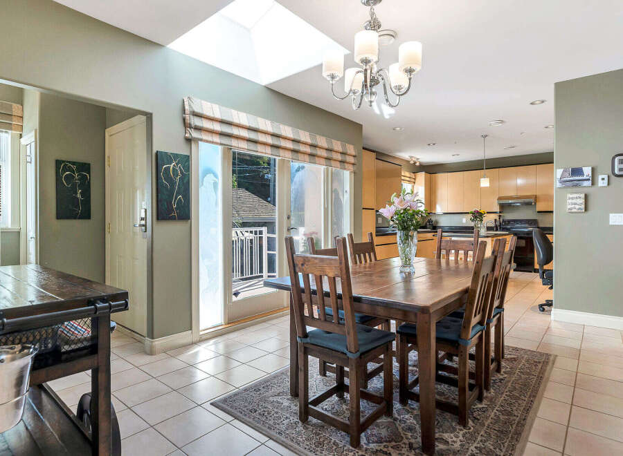 Step into this inviting dining space, perfect for both intimate meals and entertaining.
