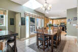 Step into this inviting dining space, perfect for both intimate meals and entertaining.