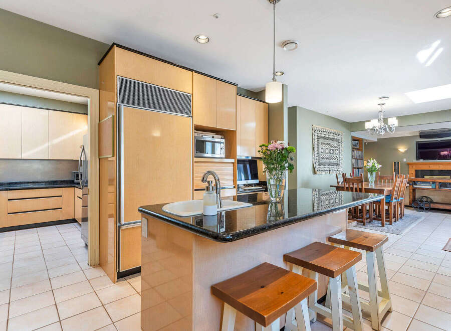 This stunning kitchen boasts modern design and functionality.